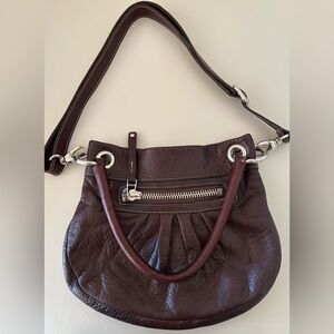 Roots brown pebbled leather purse.